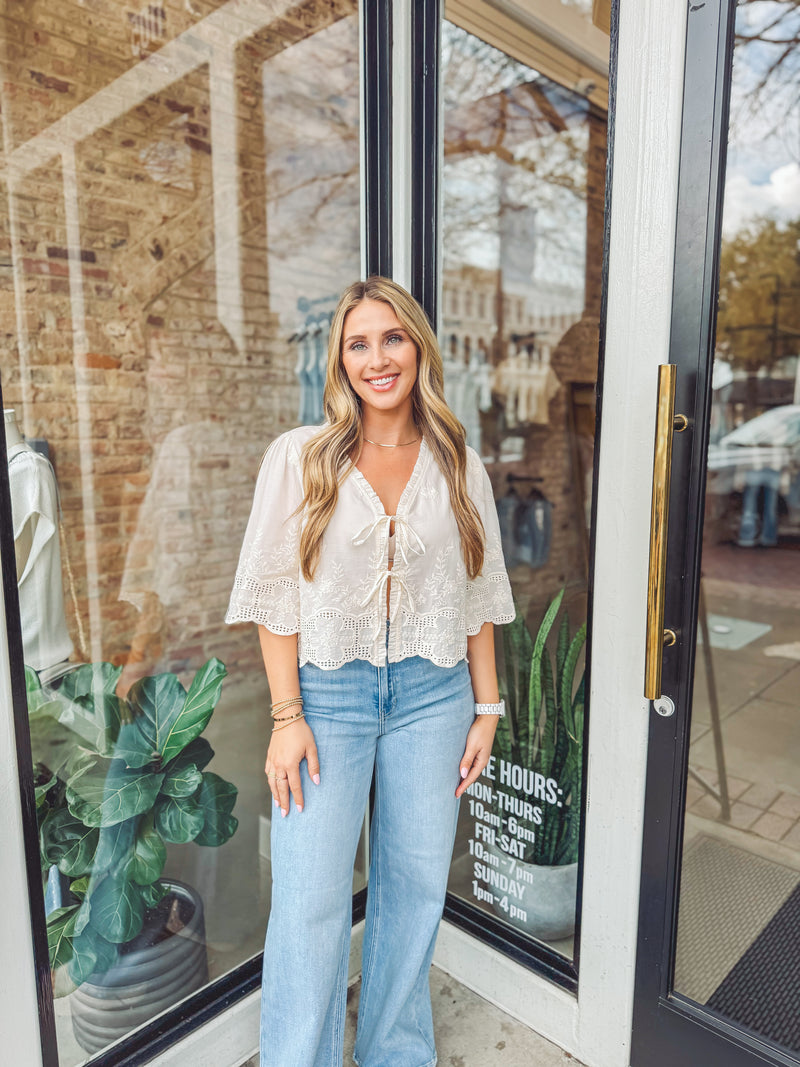 Embroidered tie blouse