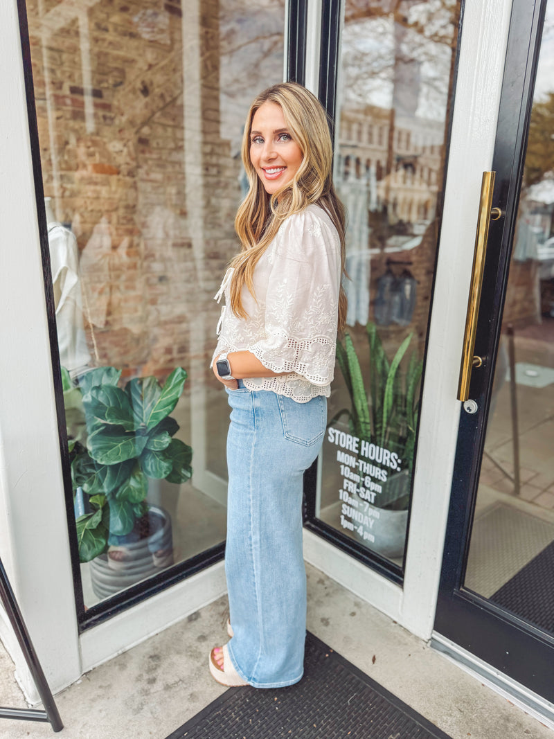 Embroidered tie blouse